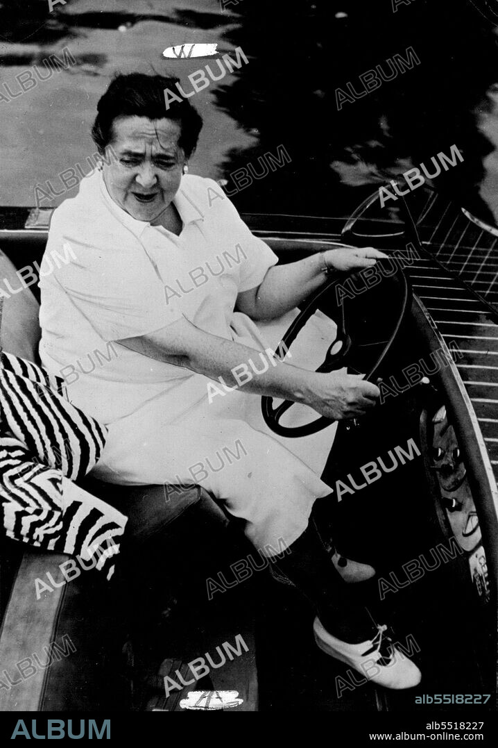Elsa Maxwell, Best-Known society hostess in U.S. - She drives her own motorboat off the Venice Lido. April 12, 1949. (Photo by Camera Press).