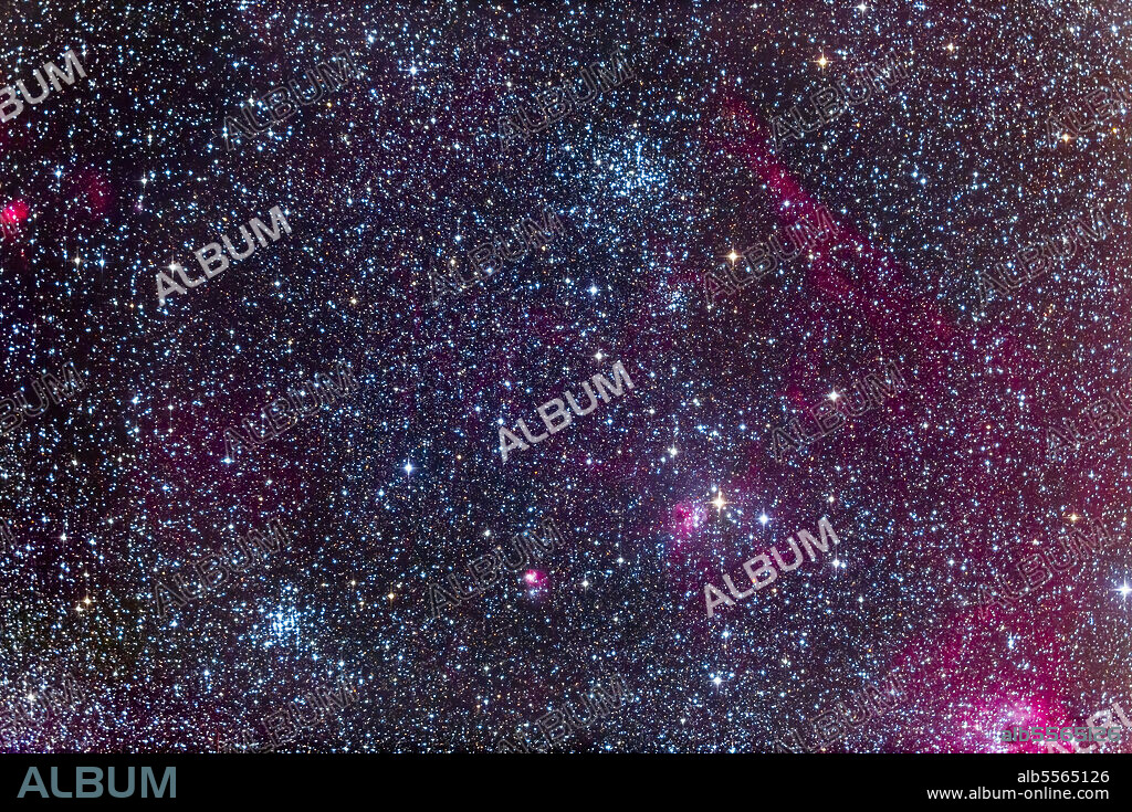 The Pinwheel Cluster (left), and the Starfish Cluster (right), in the constellation Auriga. The area is surrounded by a nebulosity including NGC 1931 (bottom center), IC 417 (right center), and IC 410 (lower right corner).