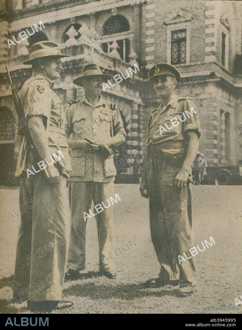 'Leaders in the Burma Campaign met in Rangoon after the city's fall on May 3, 1945', 1942. Lieutenant General Sir William Slim (GOC-in-Chief 14th Army), Air Vice Marshal Vincent (AOC 221 Group South East Asia Air Forces) and Major General H M Chambers at Government House in Rangoon, 8 May 1945. From The War Illustrated Volume 9 edited by Sir John Hammerton. [The Amalgamated Press Ltd, London, 1945].
