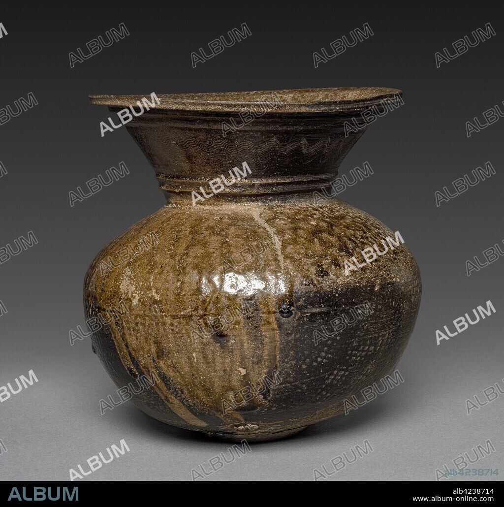 Jar with Combed Design: Sueki Ware, 400s-500s. Japan, Kofun Period (c. 3rd century-538). Stoneware with natural ash glaze, impressed and tooled patterns; diameter: 20 cm (7 7/8 in.); overall: 20.5 cm (8 1/16 in.); diameter of rim: 18.4 cm (7 1/4 in.).