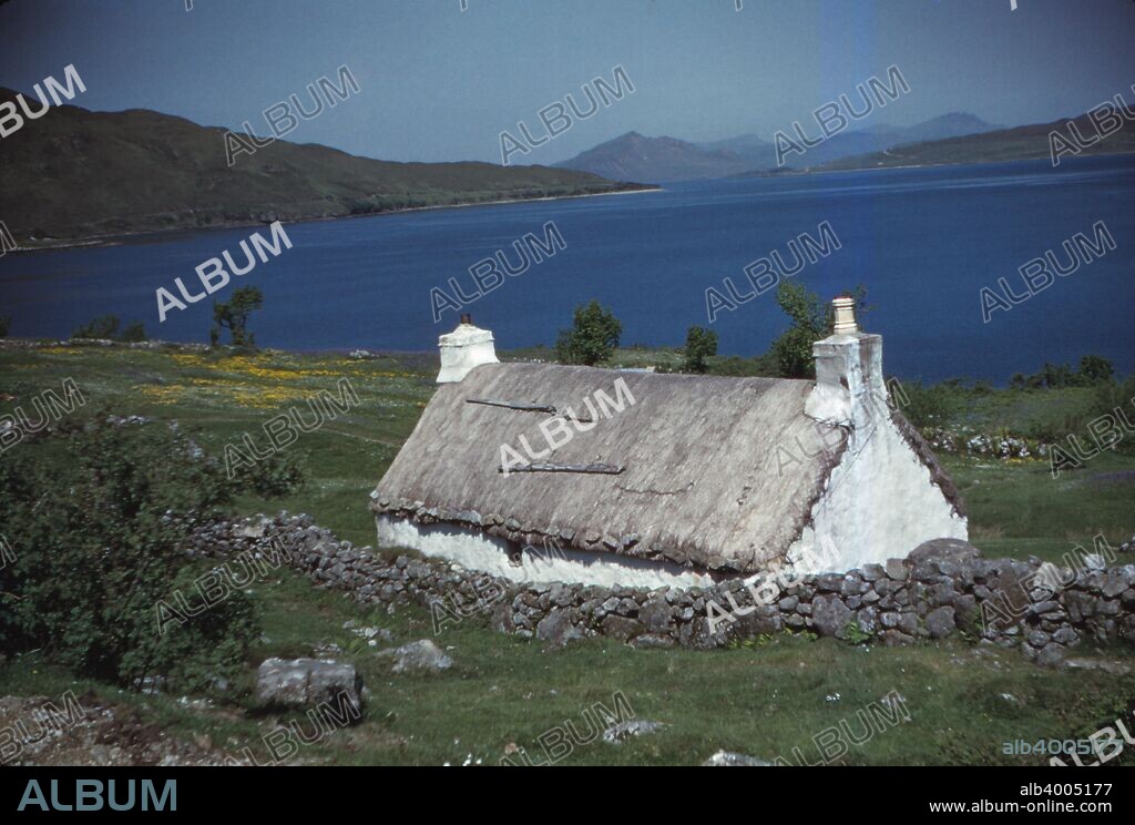 Old Crofters Cottage, near Broadford, looking North, Isle of Skye, Scotland, 20th century. Crofting is a form of land tenure and small-scale food production particular to the Scottish Highlands, the islands of Scotland, and formerly the Isle of Man. Characterised by its common working communities, the Crofters' Holdings (Scotland) Act 1886 provided security of tenure, encouraging tenants to improve land, as it ensured control could be transferred within families and passed to future generations.