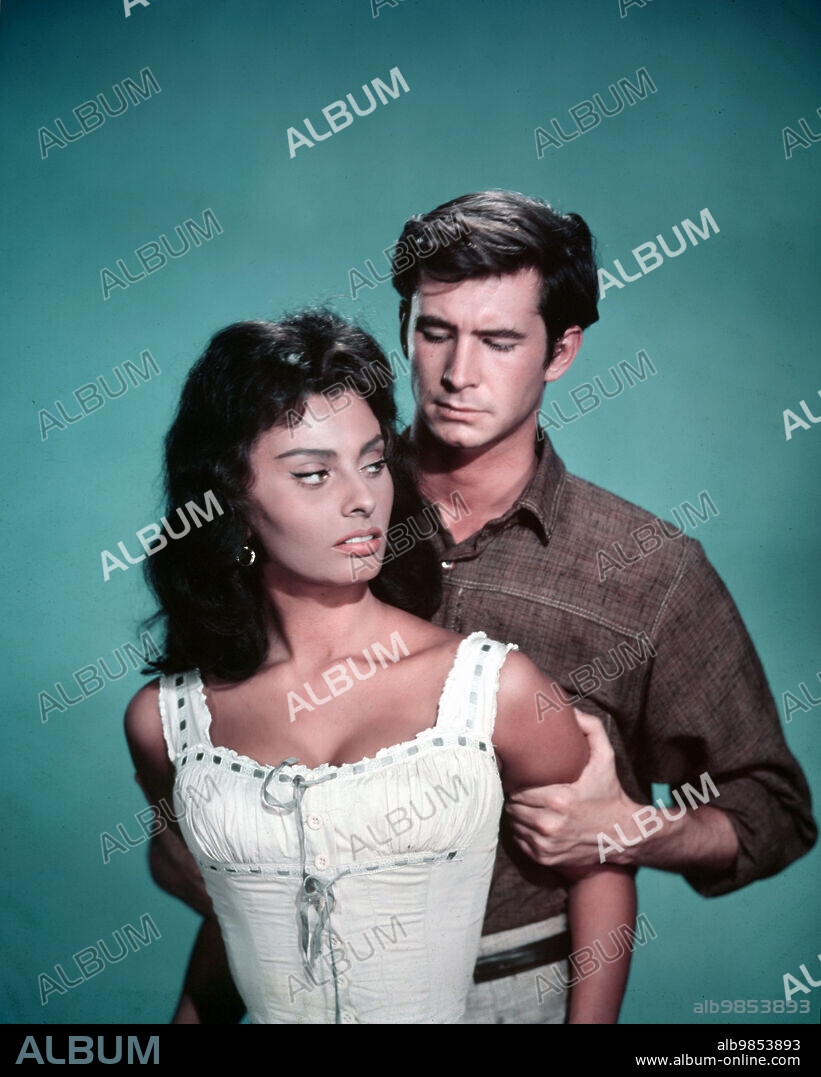 LOREN SOPHIA / LOREN SOFIA 1934/ and ANTHONY PERKINS. ANTHONY PERKINS and SOPHIA LOREN in DESIRE UNDER THE ELMS, 1958, directed by DELBERT MANN. Copyright PARAMOUNT PICTURES.