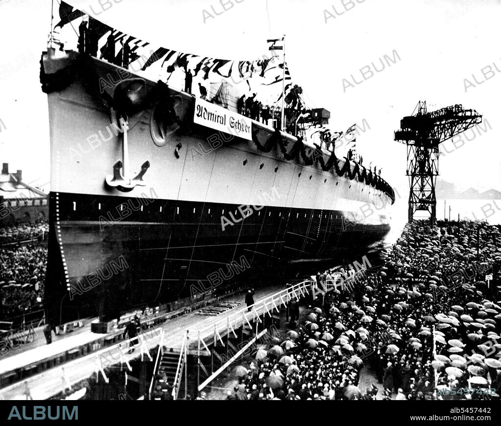 Launch Of The Second Pocket Battleship -- A General view as the admiral scheer Glideo down the slipway at the Launching ceremony. 
Admiral scheer, Germany's second pocket Battleship was Launched with full Germany at Wilhelmshaven yesterday April 1st. Almost at the same time, her sister ship the Deutschland, completed last year, was commissioned *****. May 8, 1933. (Photo by Associated Press Photo).