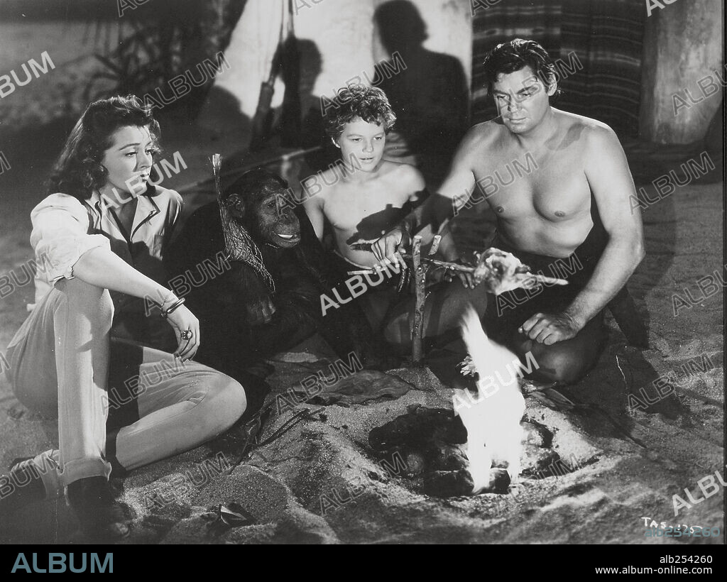 JOHNNY SHEFFIELD, JOHNNY WEISSMULLER and NANCY KELLY in TARZAN'S DESERT MYSTERY, 1943, directed by WILHELM THIELE. Copyright RKO.