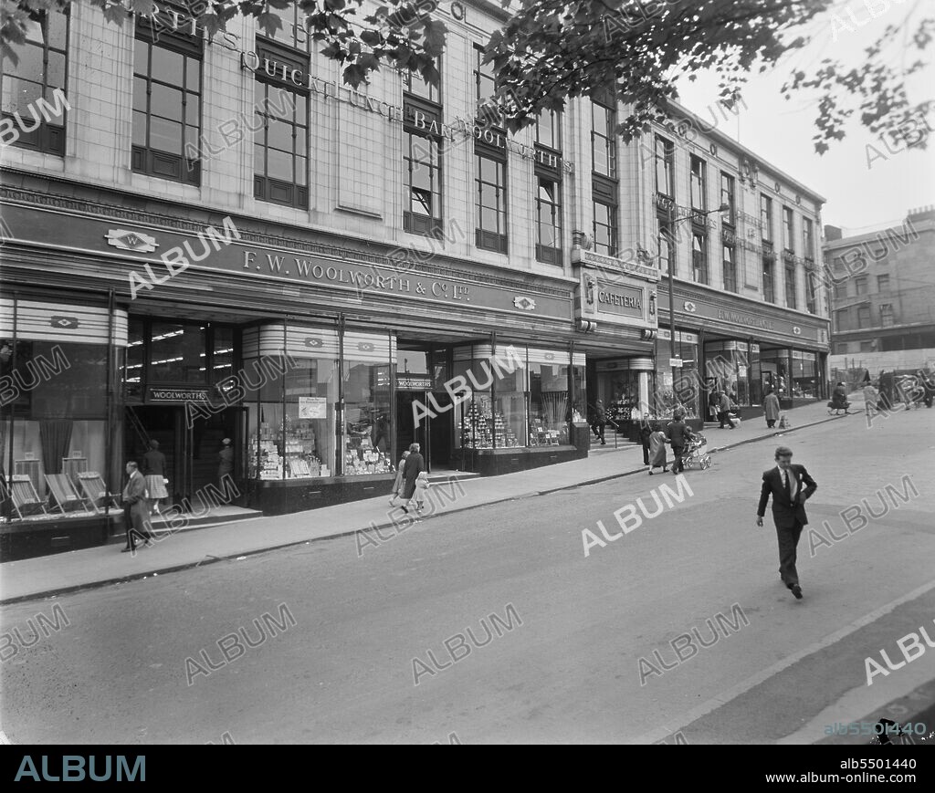 JOHN LAING PLC. F W Woolworth and Company Limited, Bull Ring Centre, Birmingham, 24/05/1961. Exterior view of the F W Woolworth & Co on Spiceal Street, prior to its redevelopment as part of the Bull Ring Shopping Centre. The caption beneath the corresponding album print reads 'Bull Ring Centre, Birmingham. East Court'.