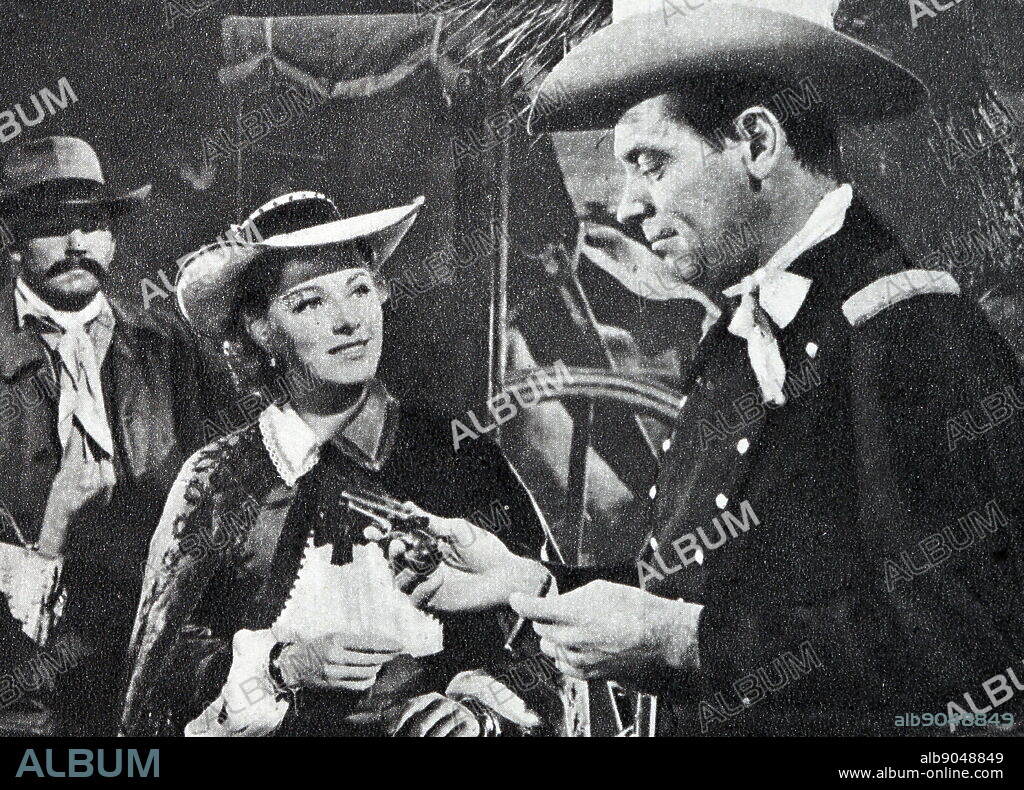 Film still from 'Escape from Fort Bravo' starring Eleanor Parker, William Holden, John Forsythe, and William Demarest.