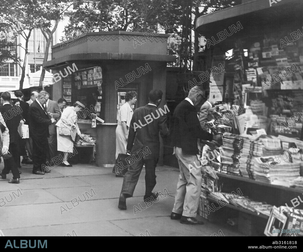 New York, New York:  c. 1938. A newspaper and magazine stand.
