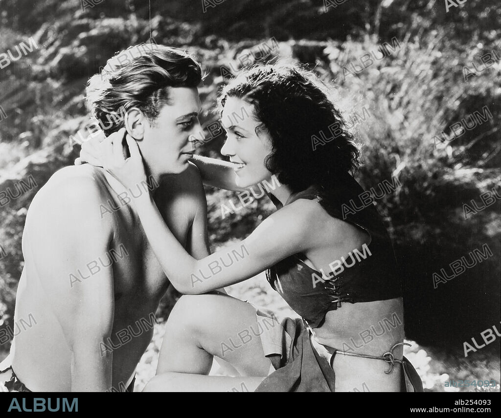 JOHNNY WEISSMULLER and MAUREEN O'SULLIVAN in TARZAN AND HIS MATE, 1934, directed by CEDRIC GIBBONS. Copyright M.G.M.