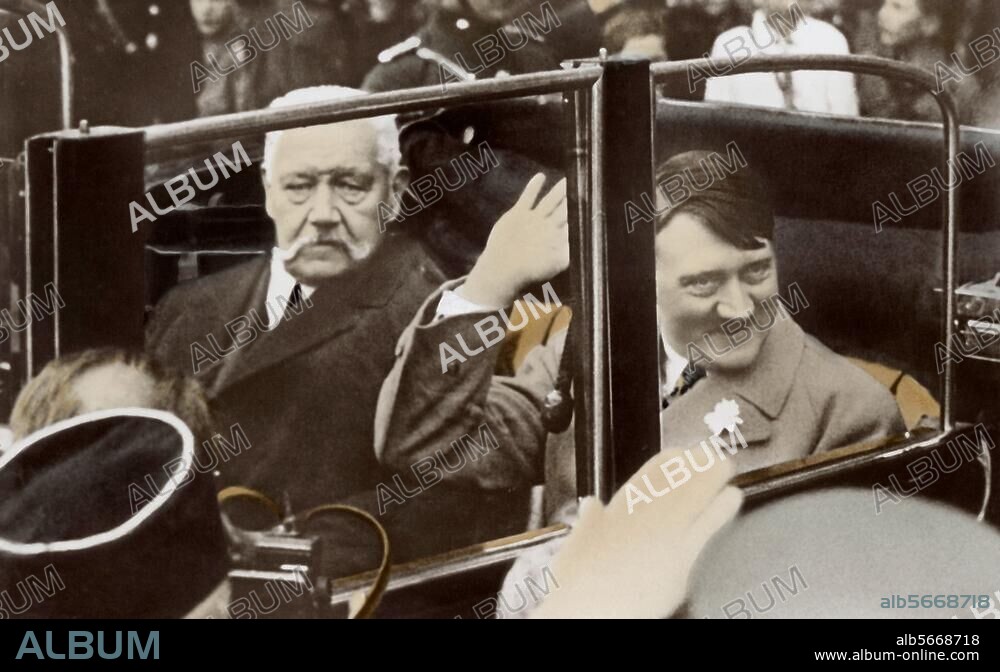 Berlin, 1 May 1933. Labour Day. Rally of the youth in Lustgarten outside the Berlin Stadtschloss. Hitler and Reich President Paul von Hindenburg in an open car, driving to Lustgarten. Photo; coloured at a later stage.