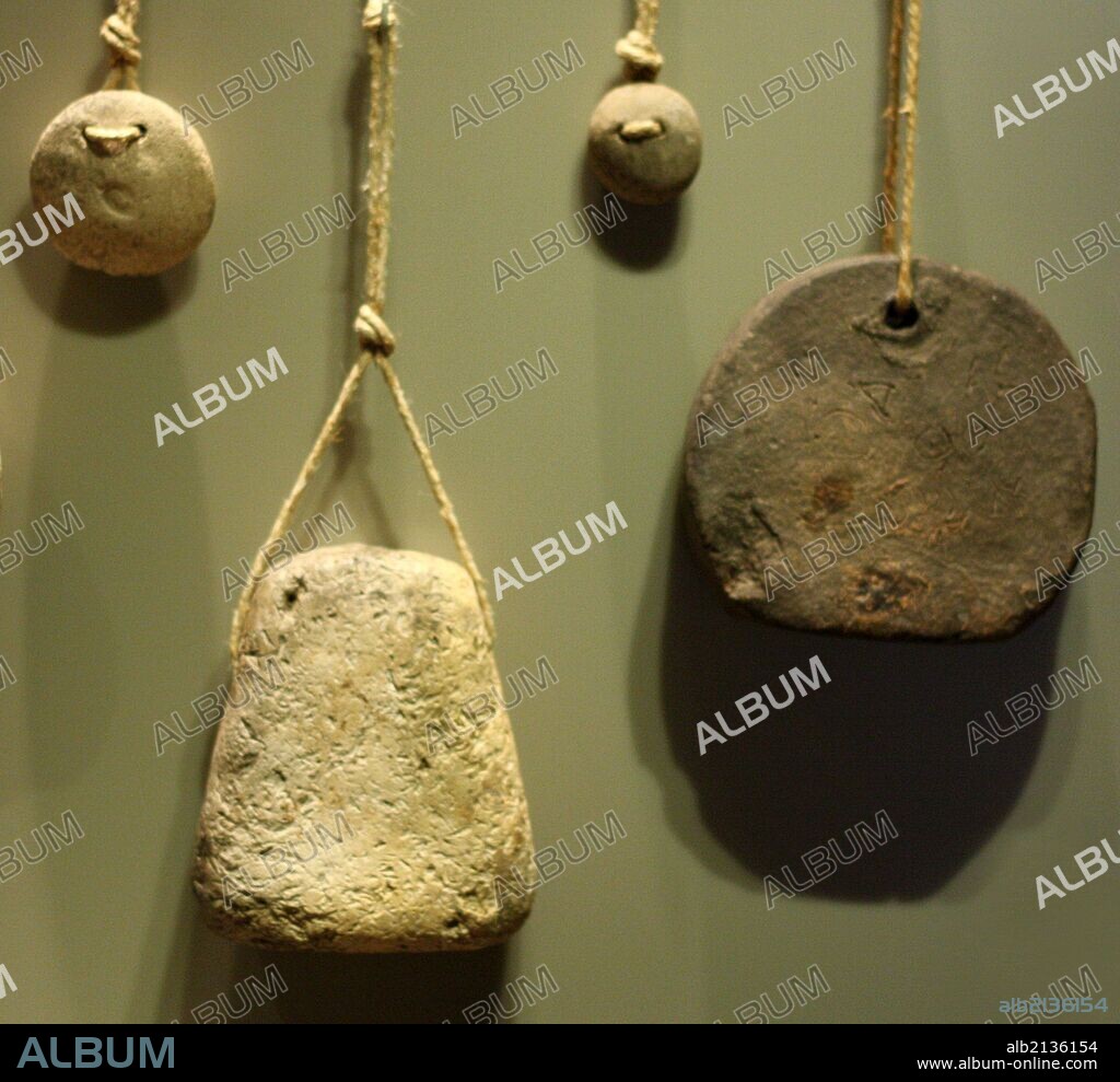 Loom and fishing net weights Ceramic and Stone 3rd and 2nd millennium BC (Photo by: Universal History Archive/UIG via Getty Images).