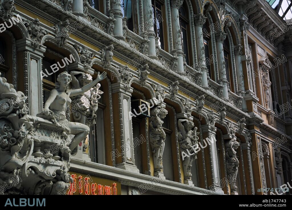 Ukraine. Odessa. "The Passage". Hotel and a mall, an architectural masterpiece, located on the corner of Deribasovskaya and Preobrajenskaya Streets. It was built in 1898-1899 for merchant M.Mendelevich. Lev Vlodek was the architect. The sculptors were S. Milman and T. Fishel. Architectural detail of the facade with statues. Europe.