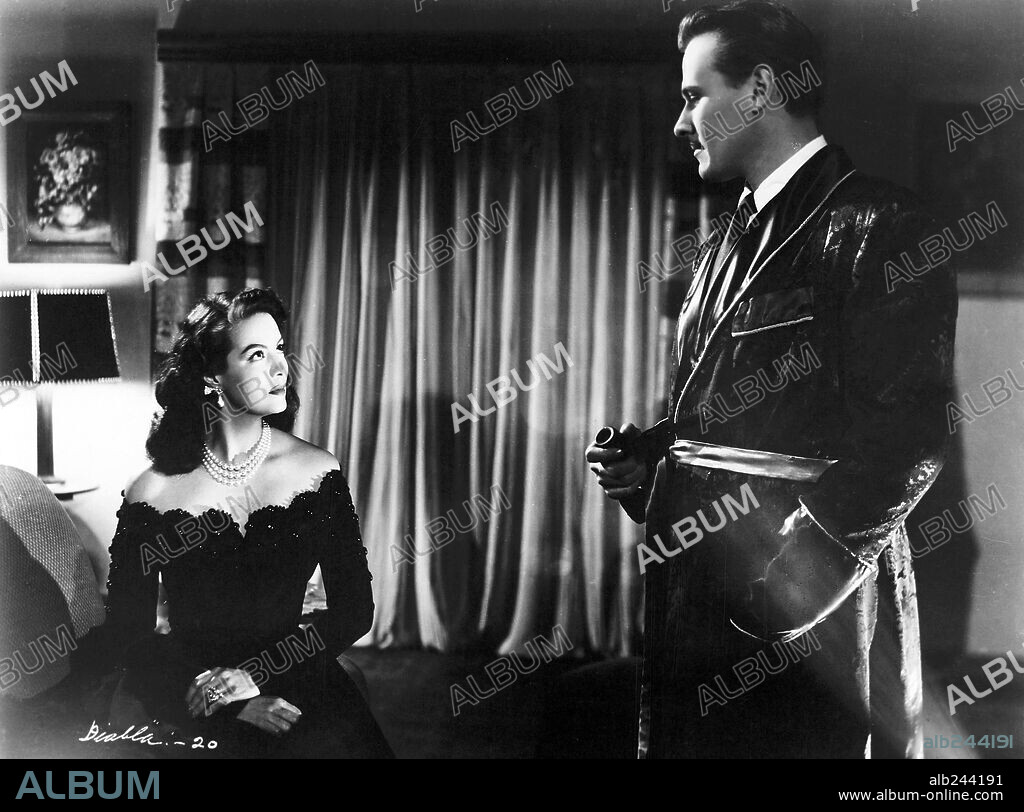 MARIA FELIX and VICTOR JUNCO in THE DEVIL IS A WOMAN, 1950 (DOÑA DIABLA), directed by TITO DAVISON. Copyright FILMEX.