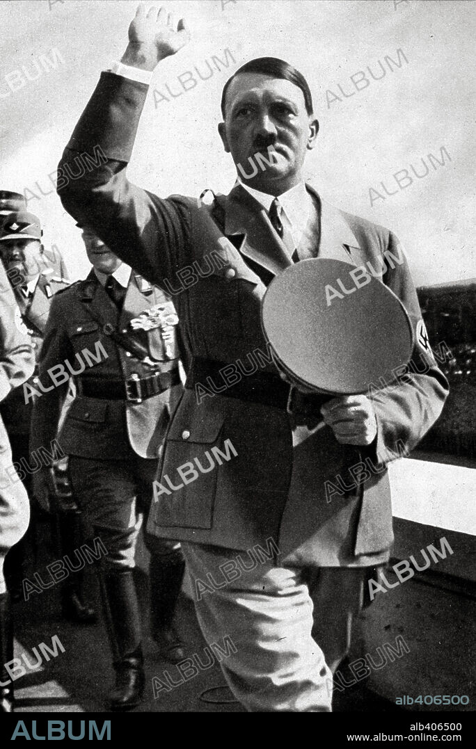 Adolf Hitler with the workers at the Zeppelin field at Nuremberg on Reichs Party Day, 1935.