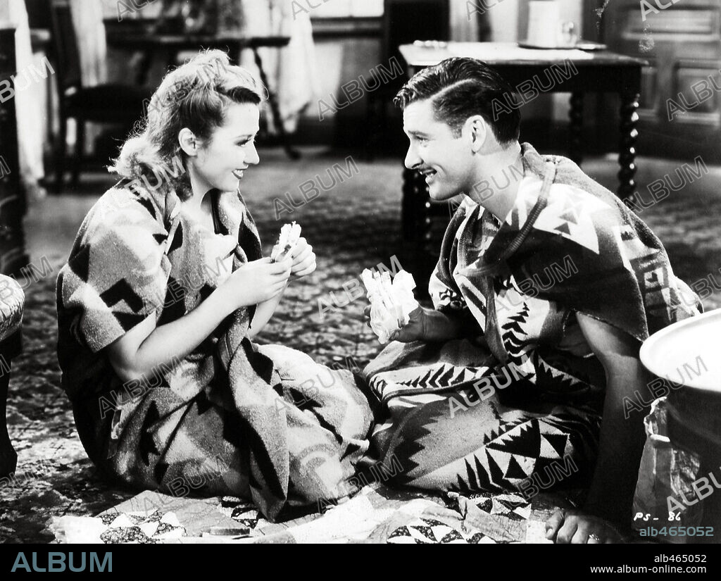 ERROL FLYNN and JOAN BLONDELL in THE PERFECT SPECIMEN, 1937, directed by MICHAEL CURTIZ. Copyright 1ST NATIONAL/WARNER BROTHERS.