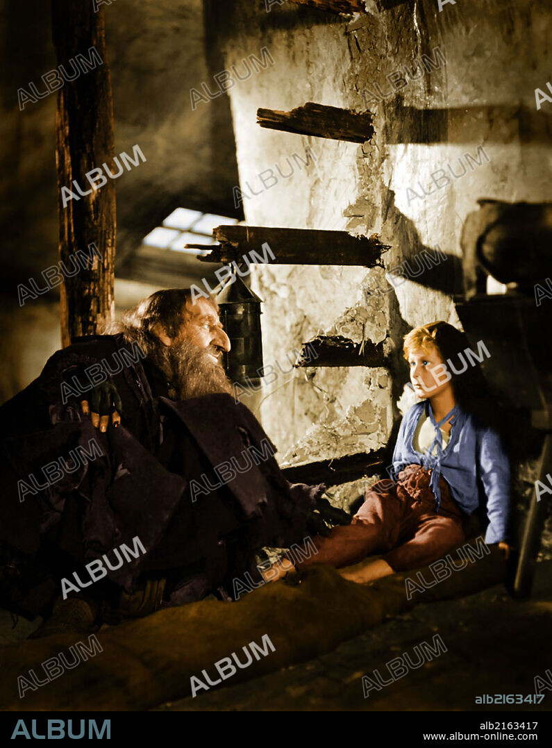 ALEC GUINNESS y JOHN HOWARD DAVIES en OLIVER TWIST, 1948, dirigida por DAVID LEAN. Copyright CINEGUILD/RANK.