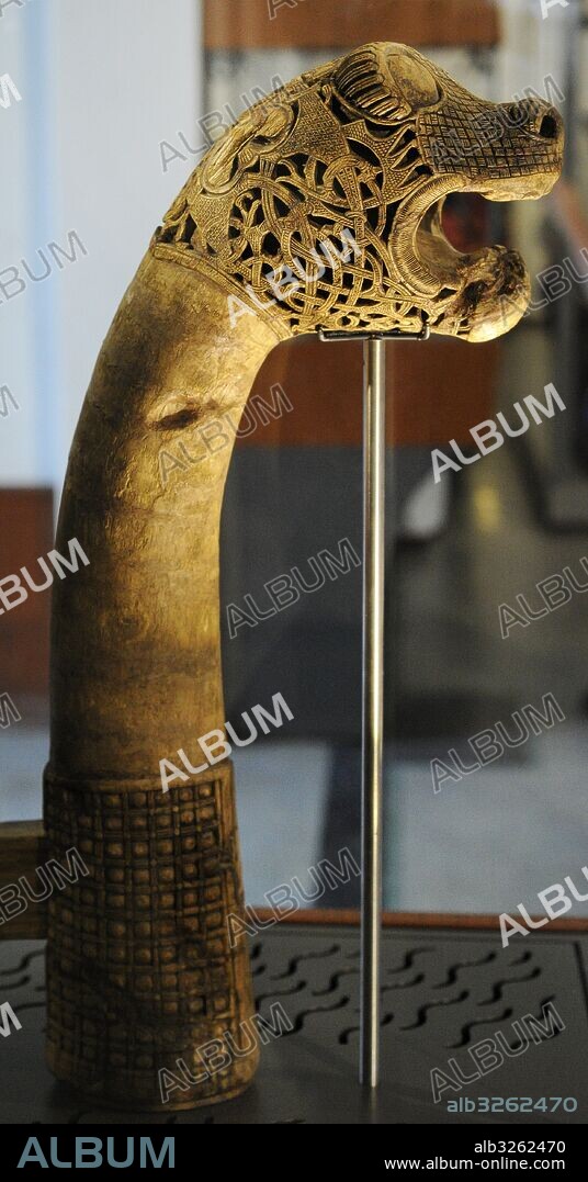 Animal-head post carved in wood. Found in the Tomb of the Boat of Oseberg, Norway. 9th century. Viking Ship Museum. Oslo. Norway.