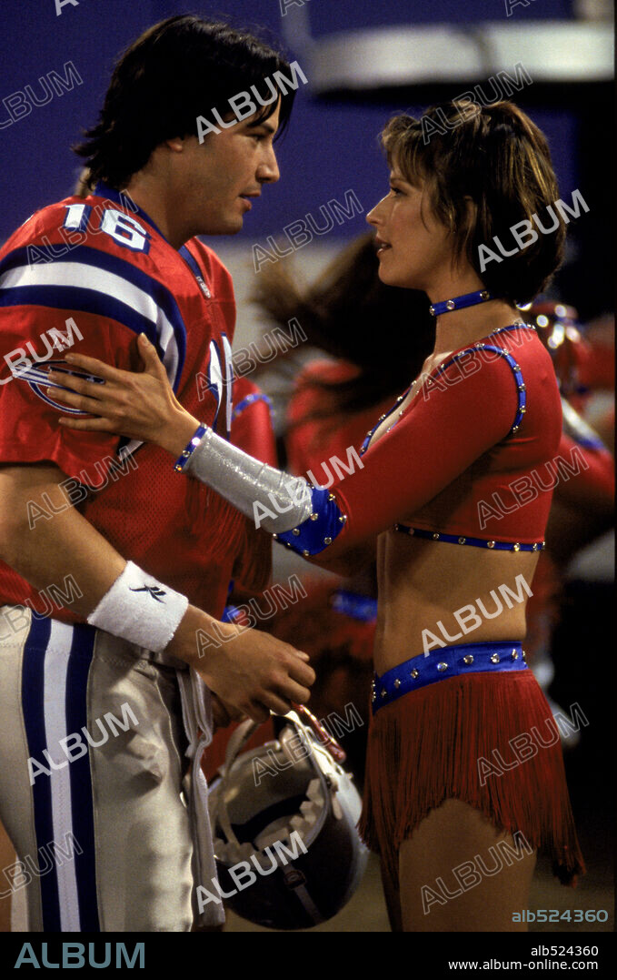 BROOKE LANGTON and KEANU REEVES in THE REPLACEMENTS, 2000, directed by HOWARD DEUTCH. Copyright WARNER BROS. PICTURES.