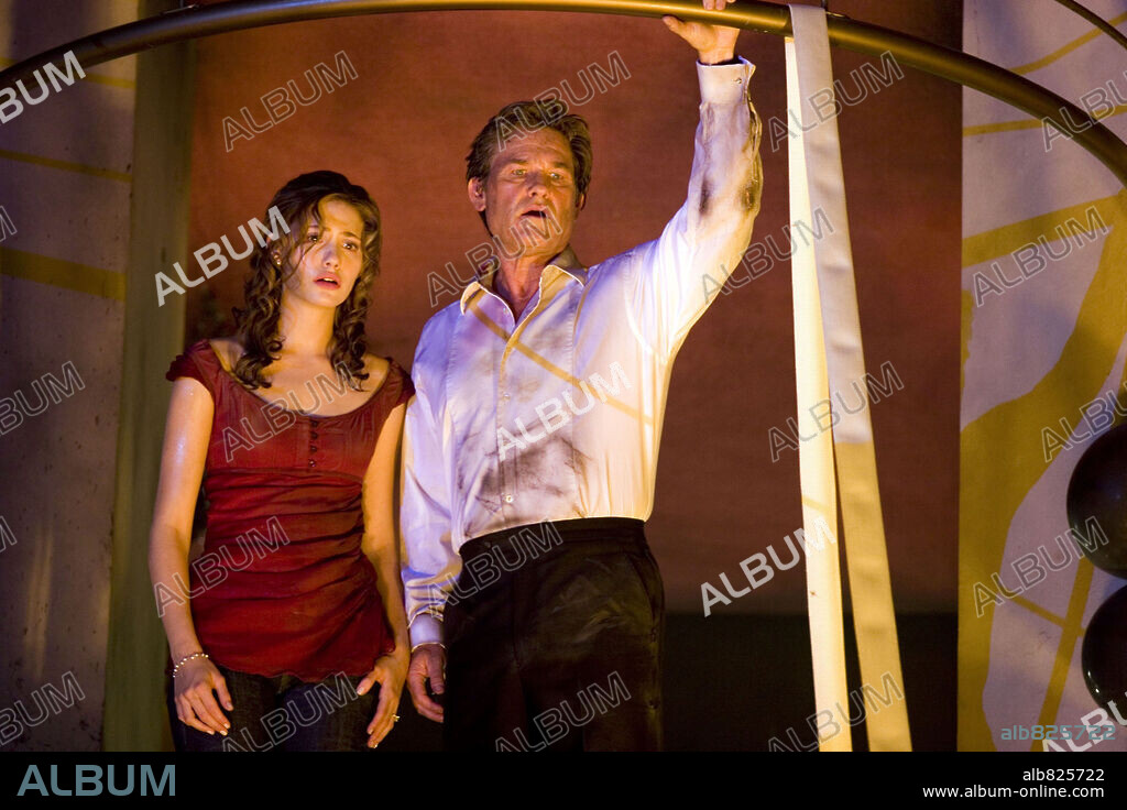 EMMY ROSSUM and KURT RUSSELL in POSEIDON, 2006, directed by WOLFGANG PETERSEN. Copyright WARNER BROS.