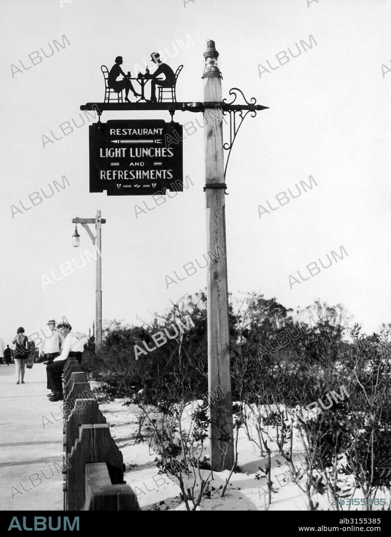 Long Island,  New York: c. 1928. Unique decorative signs are now in use at the Jones Beach State Park. This one points the way to the restaurant.