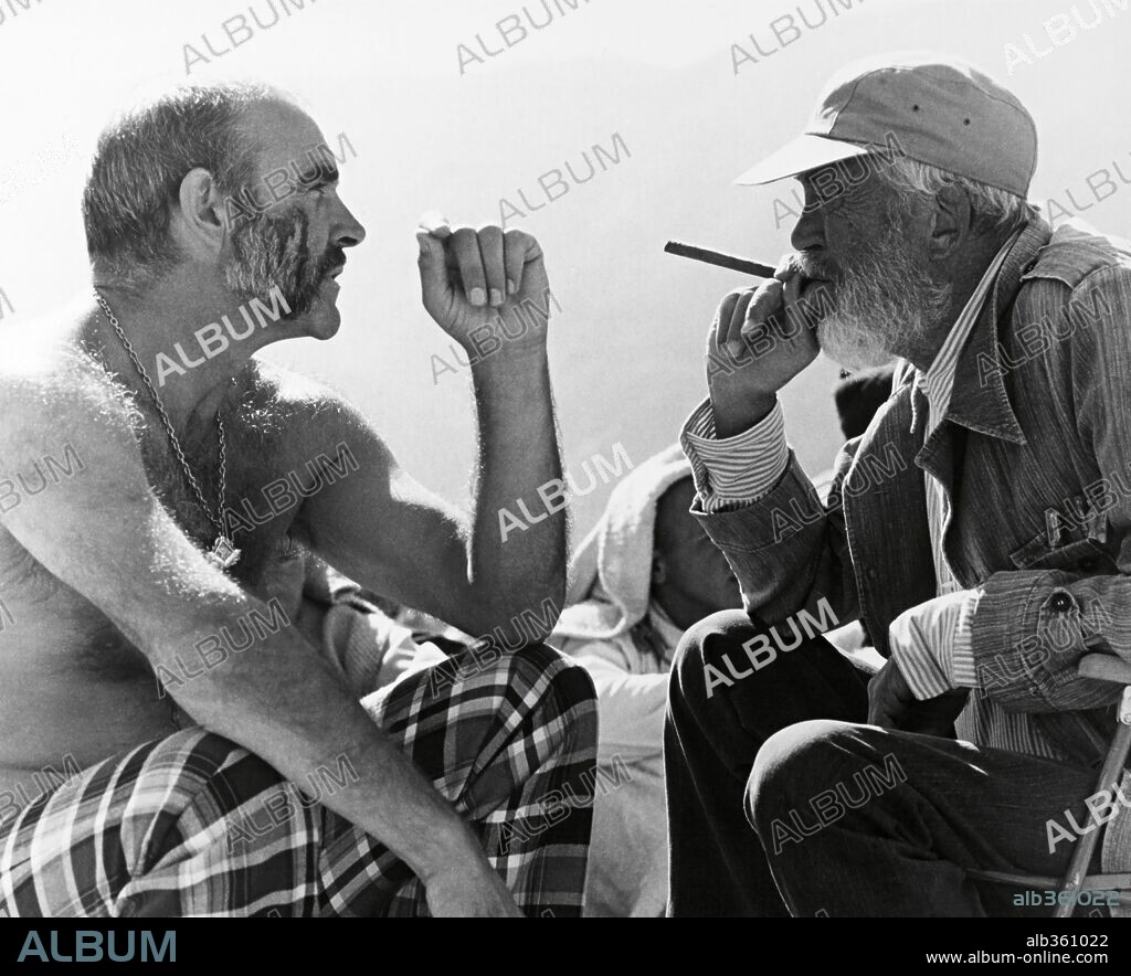 JOHN HUSTON and SEAN CONNERY in THE MAN WHO WOULD BE KING, 1975, directed by JOHN HUSTON. Copyright ALLIED ARTISTS.