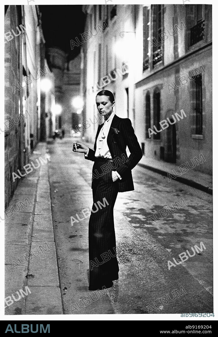 HELMUT NEWTON. Rue Aubriot, Yves Saint Laurent, French Vogue, Paris.