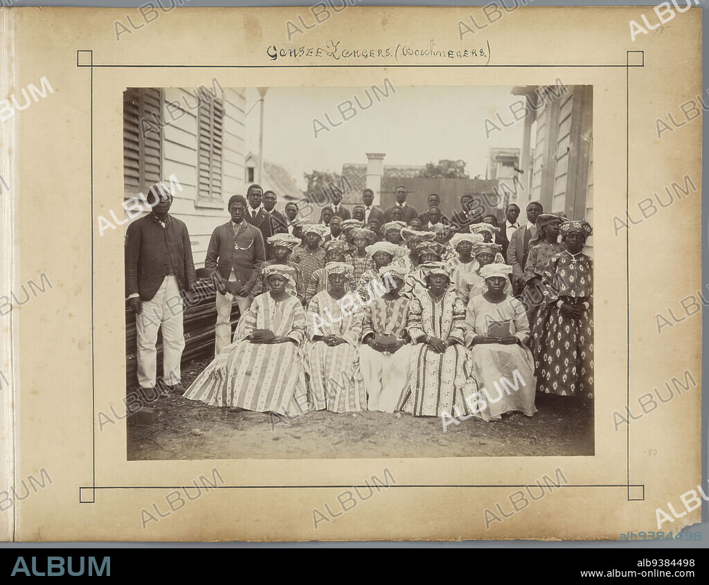 Gansee Singers (boschnegers) (title on object), Group of Surinamese men and women from Gansee., Julius Muller, C.J. Chapman, Suriname, 1898 - 1902, albumen print, height 207 mm × width 261 mm × height 297 mm × width 437 mm.