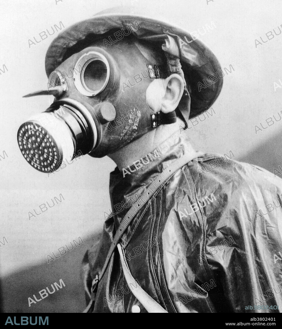 British soldier wearing a gas mask and protective suit in 1940, during the second World War.