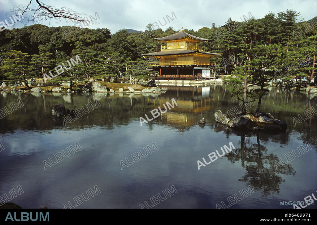 Kinkaku - the Golden Pavilion - is the name given to Rokuon-ji Temple on Kyoko-chi pond in Kyoto. Built as a 
villa for the retirement of the 3rd Shogun of Ashikaga in 1394, it was made into a Zen-temple according to the Shogun's will. The second and third floors are covered with gold leaf on Japanese lacquer; on the roof is a golden phenix.