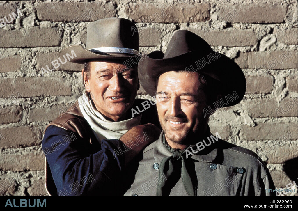 JOHN WAYNE und ROBERT MITCHUM in EL DORADO, 1966, unter der Regie von HOWARD HAWKS. Copyright PARAMOUNT PICTURES.