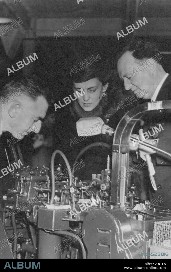 Duchess of Kent Visits War Factory - The Duchess of Kent deeply interested in one of the machines.The Duchess of Kent visited a factory near London ***** is making munitions and inspected the work in program and spoke to girls during her tour. July 1, 1943. (Photo by Fox Photos).