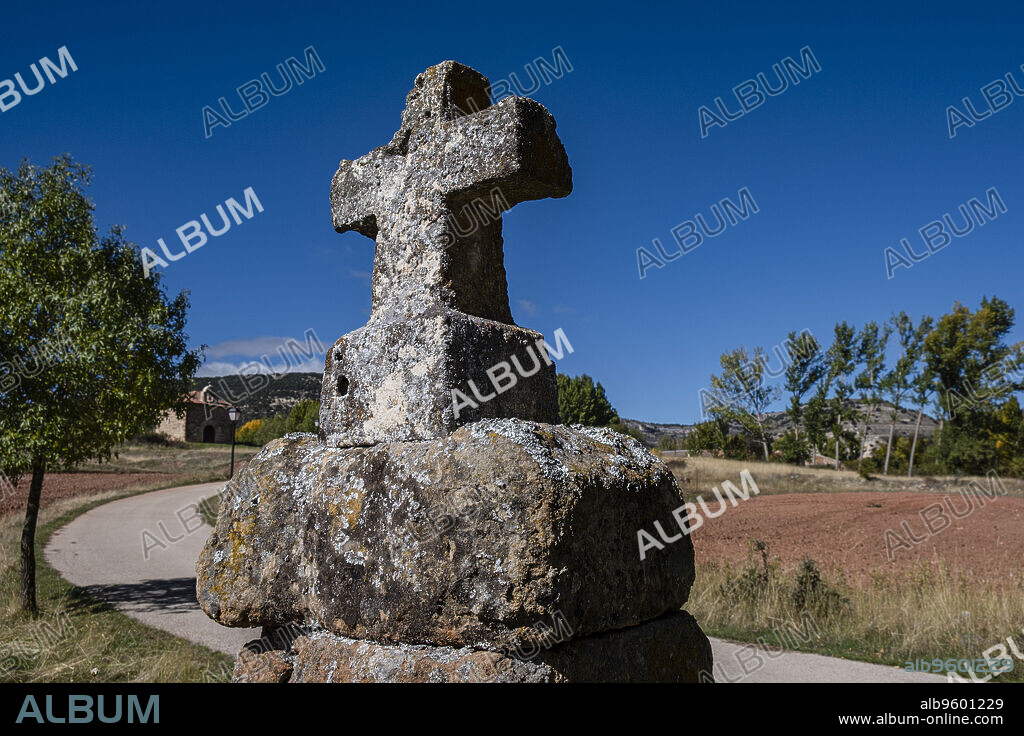 cross on the road, Ermita de Santa Coloma, Albendiego, Guadalajara province, Spain.