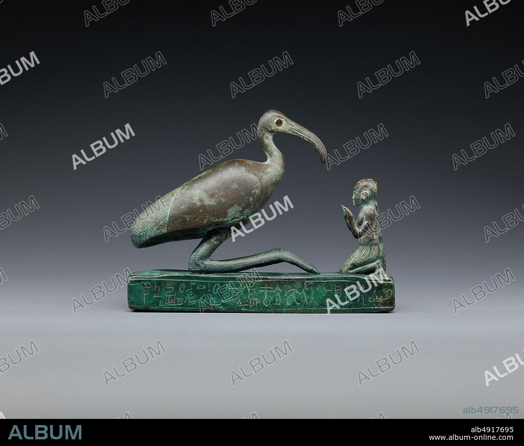 Group statue of Thoth-ibis and devotee on a base inscribed for Padihorsiese, Late Period, Dynasty 26, ca. 700500 B.C., From Egypt, copper alloy, L. 14.6 × W. 5 × D. 11.5 cm (5 3/4 × 1 15/16 × 4 1/2 in.).