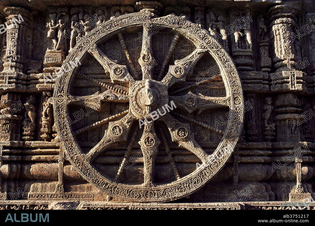 Close-up of carved chariot wheel, Sun Temple dedicated to the Hindu sun god Surya, Konarak, UNESCO World Heritage Site, Orissa state, India, Asia.