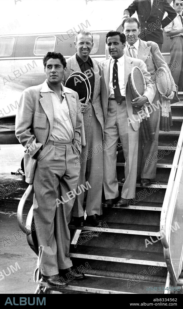 Masters of the tennis court four of the world's leading professionals leave Masters of the Tennis court ***** of the World's leading professional leave London Airport for Brussels to complete in championship matches.From to Rear - Pancho Gonzales, Don Budge, Pancho Segura and Dinny Pails.They plan to tour Germany, Switzerland and Scandinavian ***** returning to England to play at Wembley on September 19.Three of the world's top tennis professionals about to leave London by air for a continental Budge (US), Pancho Segura (US) and Dinny tour. From left: Don Pails (Australia). August 23, 1952.