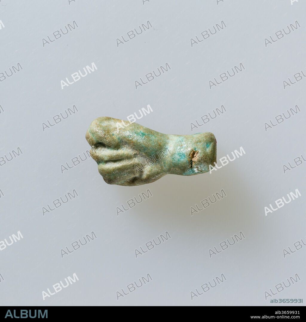 Amulet of fist with thumb thrust between first two fingers. Dimensions: L. 1.8 × W. 1 × D. 0.8 cm (11/16 × 3/8 × 5/16 in.). Date: 1st-mid 4th century.
In this amulet the thumb is placed between the first two fingers of the fist. This is a Roman amulet connected with sexuality.