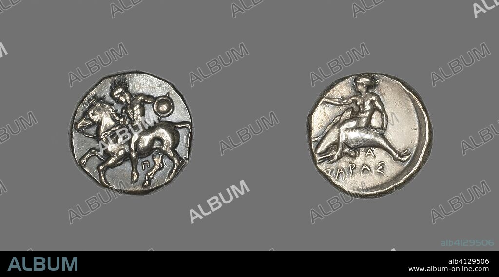 ANCIENT GREEK. Stater (Coin) Depicting a Horseman. Greek; minted in Taras, Italy. Date: 380 BC-345 BC. Dimensions: Diam. 2 cm; 7.95 g. Silver. Origin: Taranto.