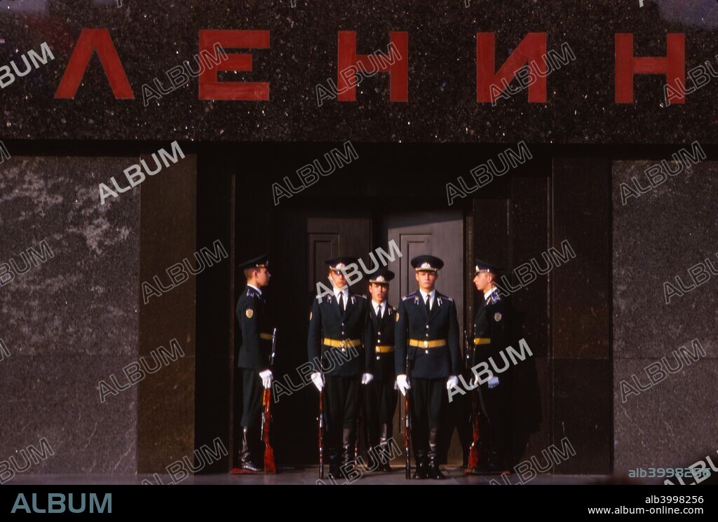 Changing Guard at Lenins Tomb, Red Square, Moscow, 20th century.  Armed police and military guards at doorway to mausoleum and resting place of Vladimir Lenin, whose embalmed body has been on public display in this granite structure designed by Aleksey Shchusev, since 1924.