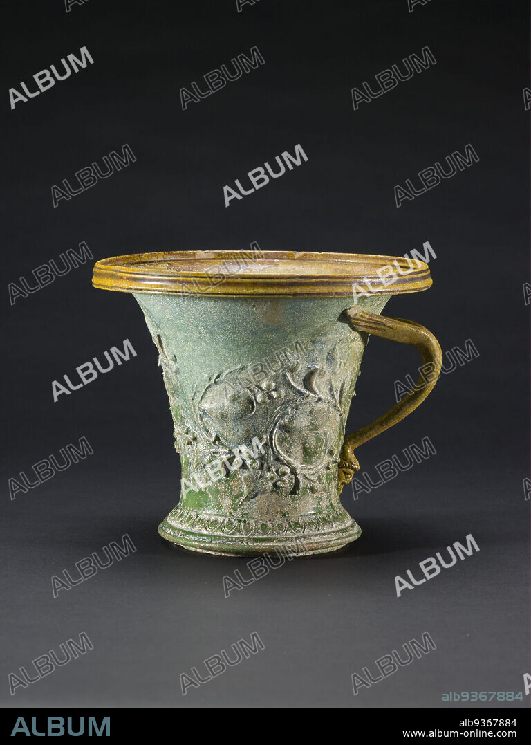 One-handled Cup (modiolus), Roman, Early Imperial period, 27 BCAD 330, 1st century BC1st century AD, Lead-glazed ceramic, Mediterranean, Roman Empire, Ceramics, 5 3/4 in. x 7 in. (14.6 x 17.8 cm).