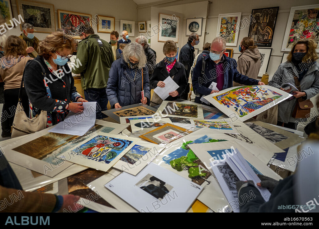 Fry Art Gallery Annual Exhibition and Sale_Saffron Walden_Essex_UK_ 20/21 November 2021_Photo Brian Harris. The first Fry Art Gallery Annual Exhibition and Art sale since before covid 19 restrictions came into place was held in Saffron Walden, home to the Fry Art Gallery and collection over tthe weekend of 20 and 21 of November. Prices ranged from £50 to £5000. Monies raised will go towards to completion of ongoing refurbishment works at the main Fry Gallery. The main Fry Art Gallery building was designed to house the art collection of Francis Gibson, a local Quaker businessman who died in 1859. Artists represented and were selling well included Edward Bawden, John Aldridge RA, Edwin Smith, Giuliana Lazzerini, Michael Rothenstein, Bernard Cheese, Eduardo Paolozzi and Eric Ravilious amongst many others. Many members of the group were based in the Saffron Walden and Great Bardfield area of North West Essex. Photo Brian Harris / Alamy News.