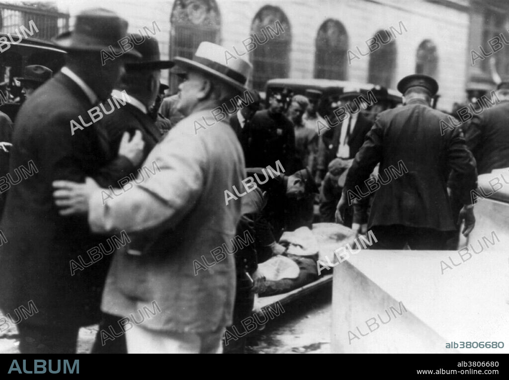 Entitled: "Anarchist bombings, New York City." The dead in front of Morgan's bank. On September 16, 1920, a horse drawn wagon stopped across the street from the headquarters of the J.P. Morgan bank at 23 Wall Street. Inside the wagon, 100 lbs of dynamite with 500 lbs of cast-iron sash weights exploded in a timer-set detonation. The horse and wagon were blasted into small fragments, but the driver was believed to have left the vehicle and escaped. The 38 victims, most of whom died within moments of the blast, were mostly young people who worked as messengers, stenographers, clerks, and brokers. The bomb caused more than $2 million in property damage ($23,500,000 with inflation) and destroyed most of the interior spaces of the Morgan building. There were 143 seriously injured, and the total number of injured was in the hundreds. The bombing was never solved, although investigators and historians believe the Wall Street bombing was carried out by Italian anarchists, a group responsible for a series of bombings the previous year. Photographed by Bain News Service, 1920.
