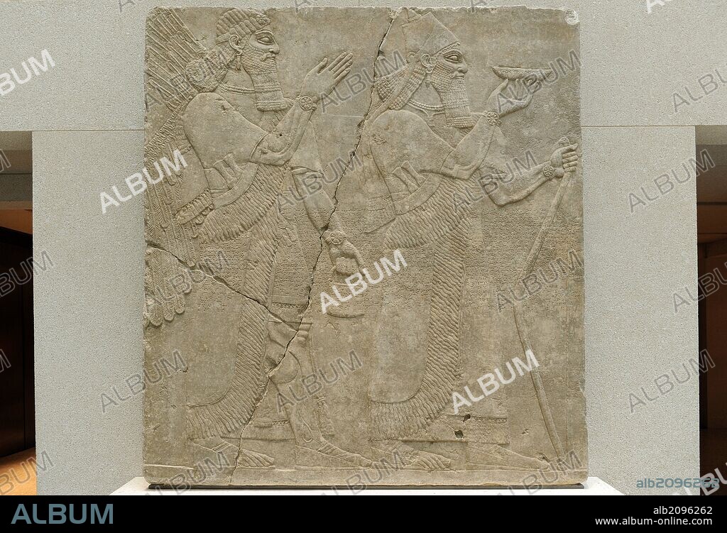 ARTE MESOPOTAMICO-ASIRIO. Asurbanipal junto a un genio alado. Relieve datado en el siglo IX a. C. Alabastro. Procedente del PALACIO DE ASURBANIPAL. Nimrud. Neues Museum. Berlín. Alemania. Europa.