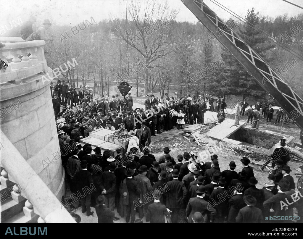 Removal of Lincoln's coffin. People gathered around crate containing coffin of President Abraham Lincoln. In 1900 a complete reconstruction of Lincoln's tomb was needed, unhappy with the work, his son had his body exhumed a year later and placed into a crypt.