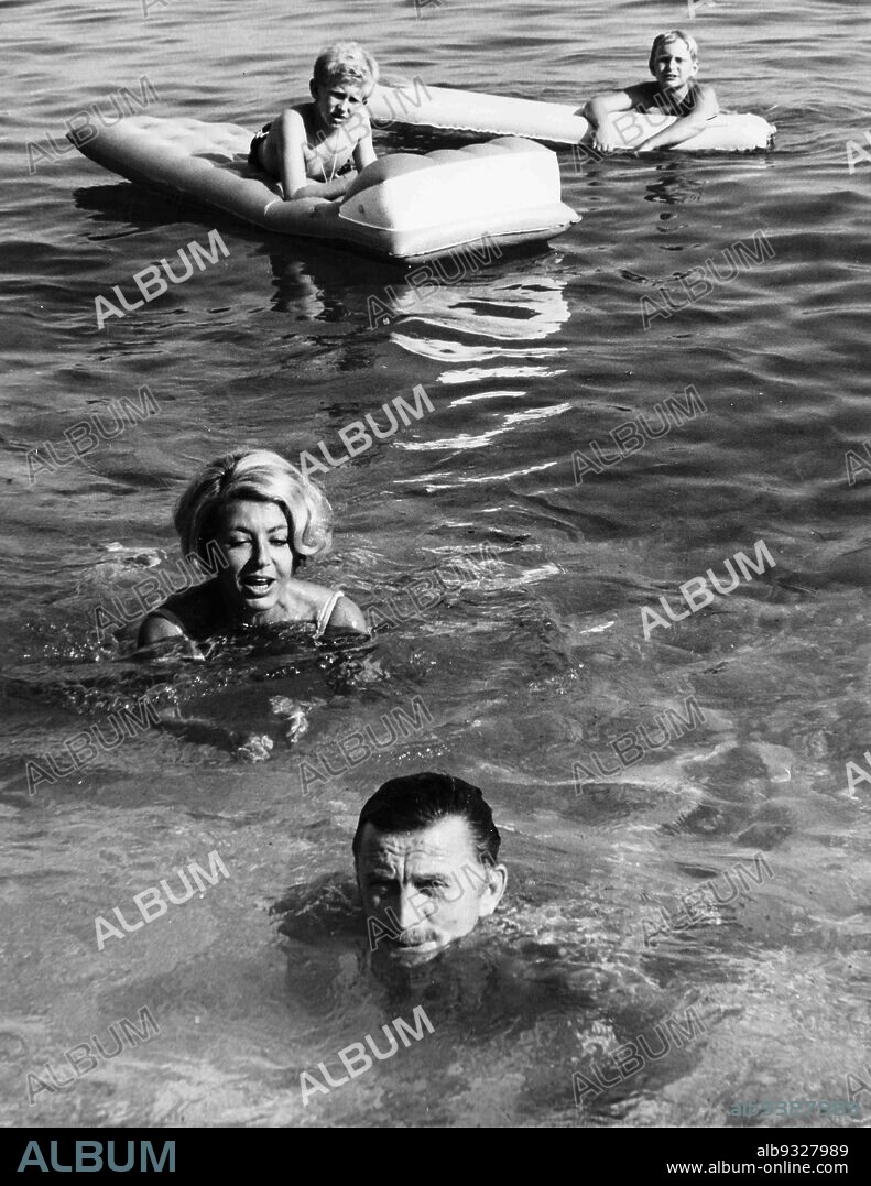 Kirk Douglas, Anne Buydens, Peter Douglas and Eric Douglas, Holidays In The Principality Of Monaco, August 1967.