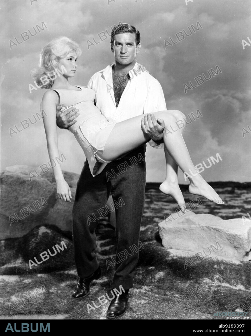 ROD TAYLOR and YVETTE MIMIEUX in THE TIME MACHINE, 1960, directed by GEORGE PAL. Copyright M.G.M.
