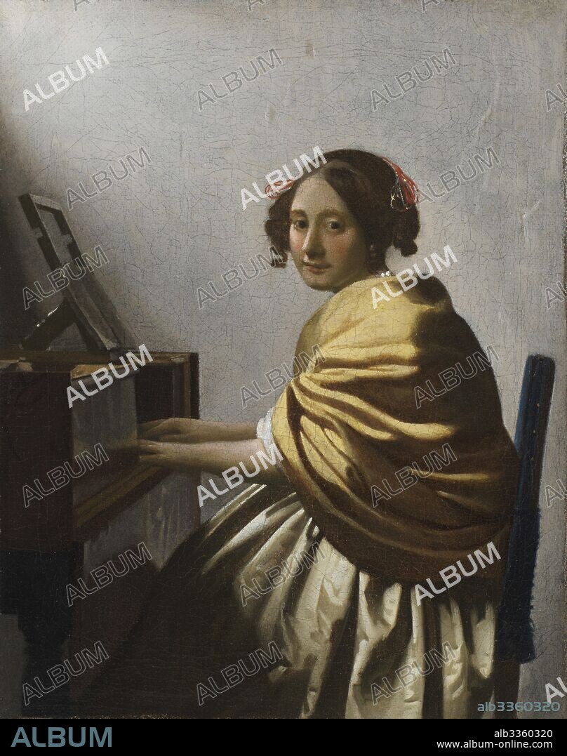 JAN VERMEER (JOHANNES). A Young Woman seated at a Virginal.