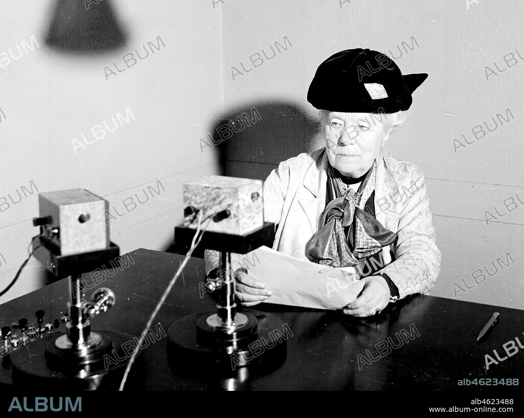 Swedish writer, Selma Lagerlof (1858-1940), reading on the radio, 1930s.