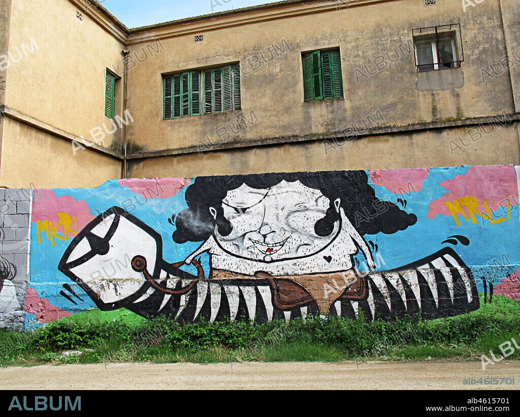 Ilustración de un personaje de cómic, graffiti mural, Mataró, provincia Barcelona, Barcelona en 2013.