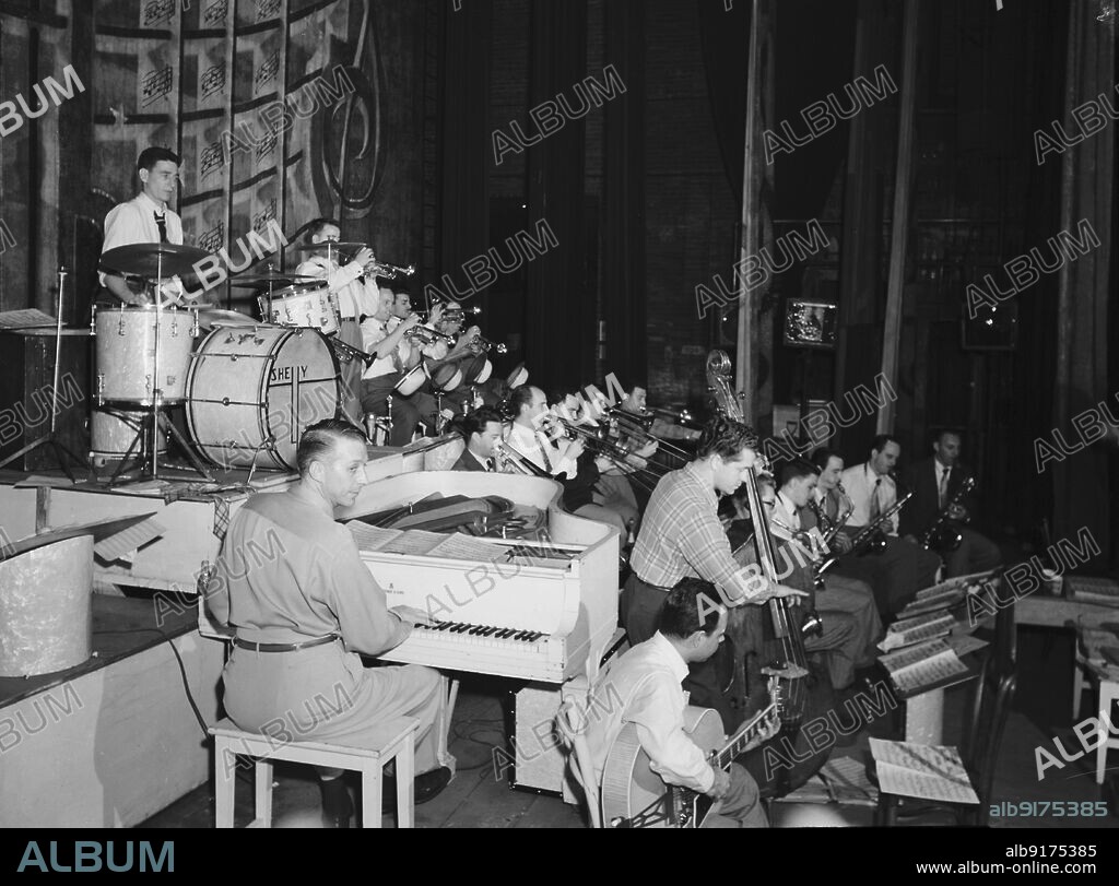 WILLIAM PAUL GOTTLIEB. Portrait of Stan Kenton, Laurindo Almeida, Eddie Safranski, Bob Cooper, Chico Alvarez, Ray Wetzel, and Harry Betts, Richmond, Va.(?), 1947 or 1948.