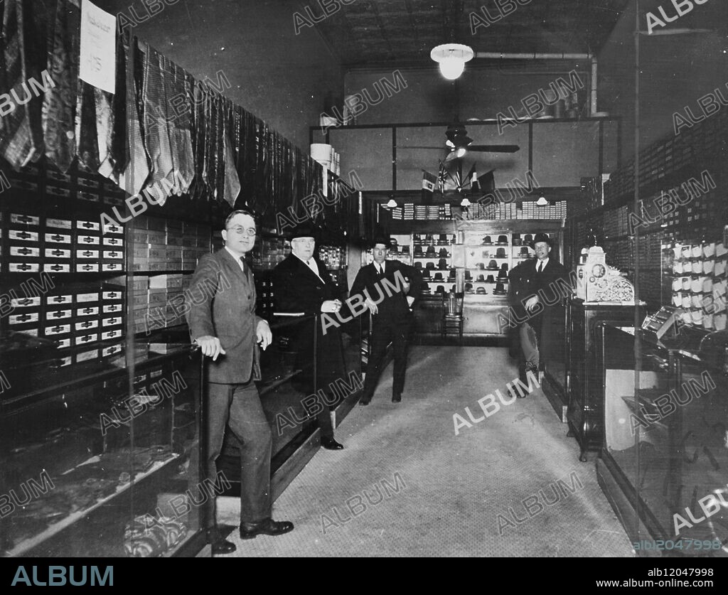Harry S. Truman (left) as a partner in the Truman and Jacobson haberdashery in Kansas City an unsuccessful business venture. 1920.
