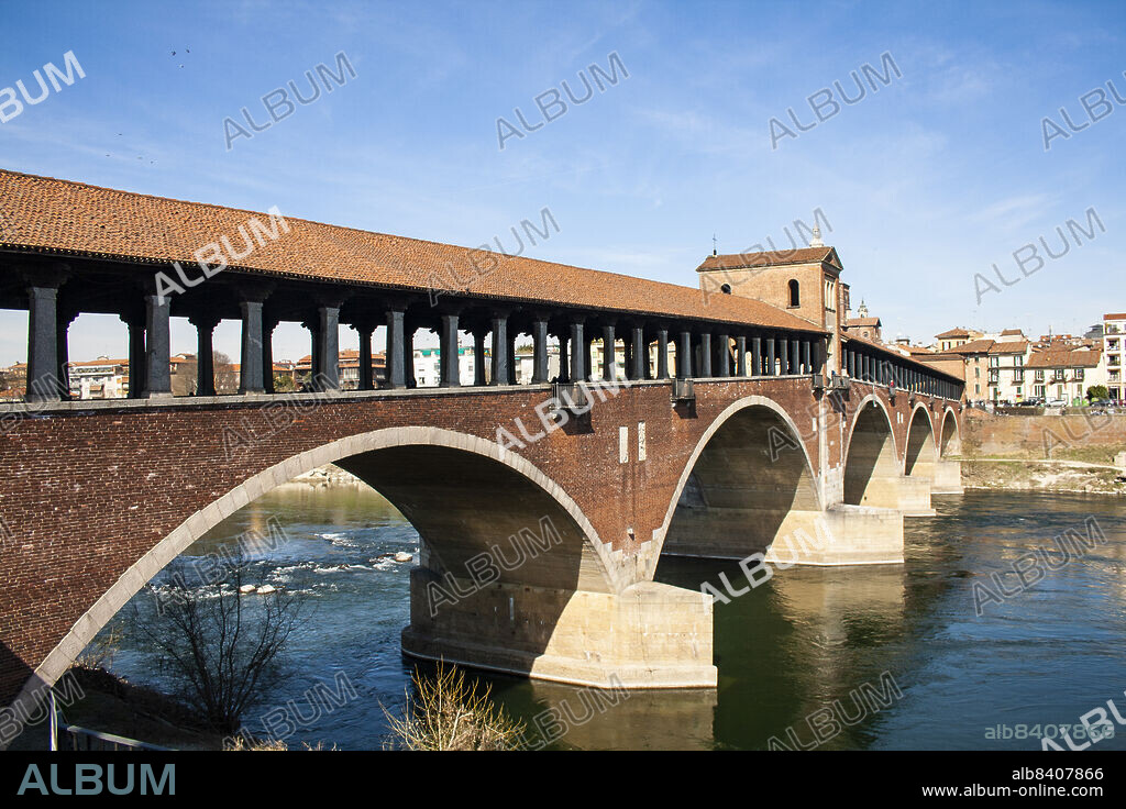 Pavia, Lombardy, Italy, Europe. Ticino River (Tessin, Ticinus). The river rises in the Val Bedretto in Switzerland at the frontier between the cantons of Valais and Ticino, is fed by the glaciers of the Alps and later flows through Lake Maggiore, before entering Italy. The Ticino joins the Po a few kilometres from Pavia. The Ponte Coperto (Covered Bridge) of Pavia.
